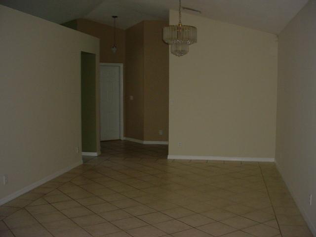 11217 Harbour Springs Circle Boca Raton, FL 33428 - Photo 5 of 12 an empty room with a empty space