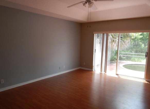 11217 Harbour Springs Circle Boca Raton, FL 33428 - Photo 9 of 12 an empty room with a window