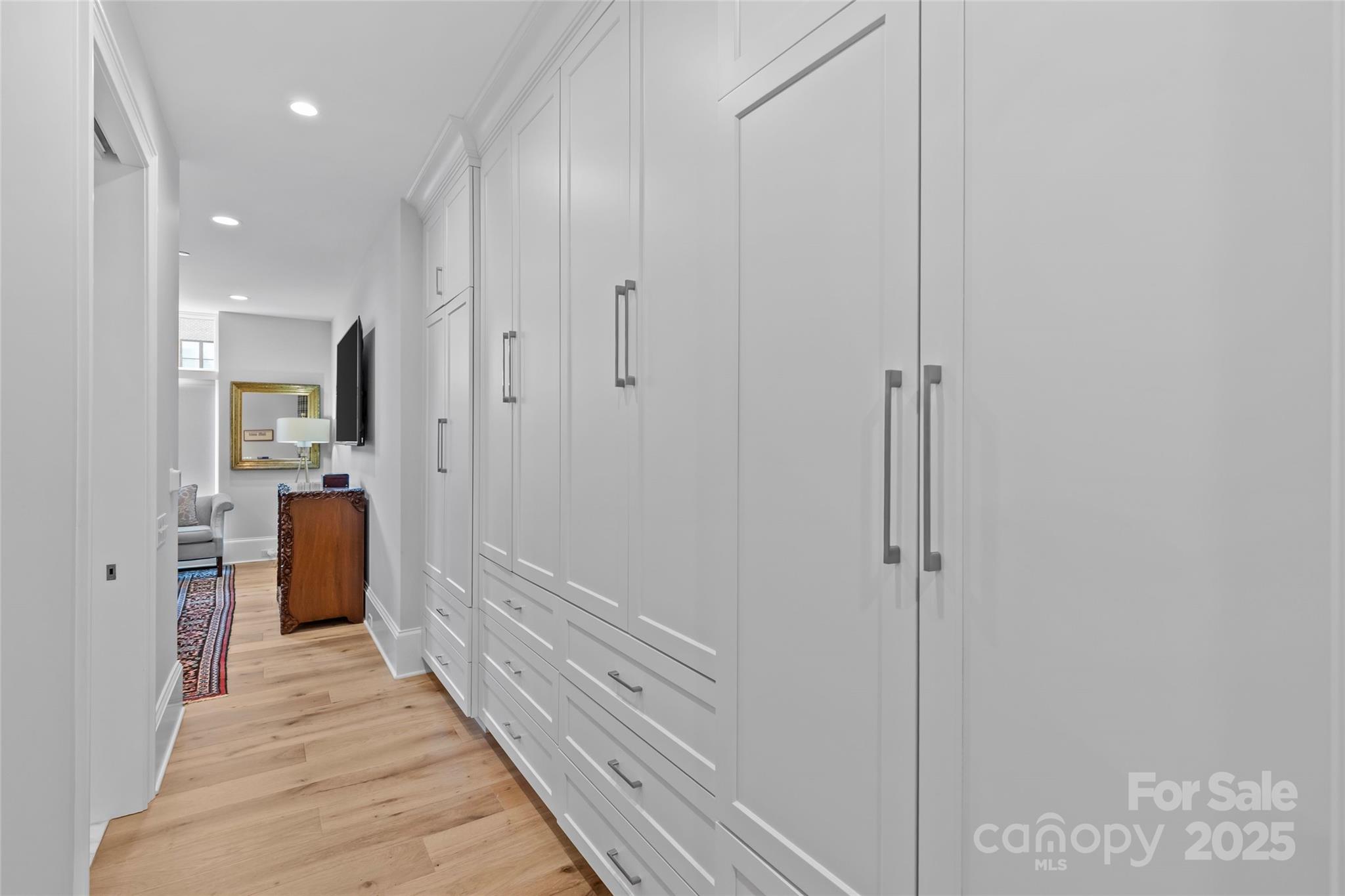 1500 Queens Road, Unit 104 Charlotte, NC 28207 - Photo 25 of 43 a bathroom with a sink and a mirror