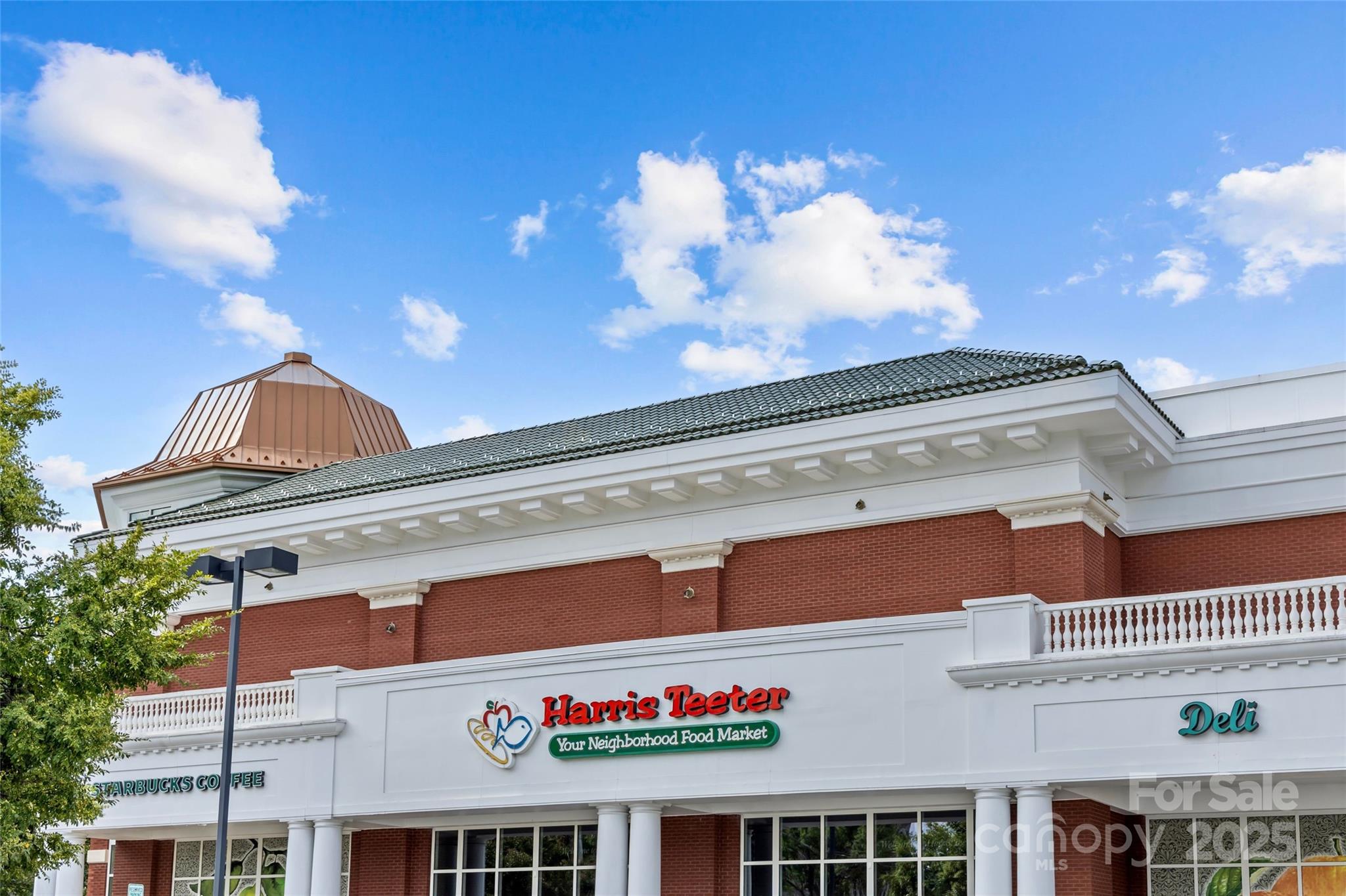 1500 Queens Road, Unit 104 Charlotte, NC 28207 - Photo 35 of 43 a sign that is on the side of a building