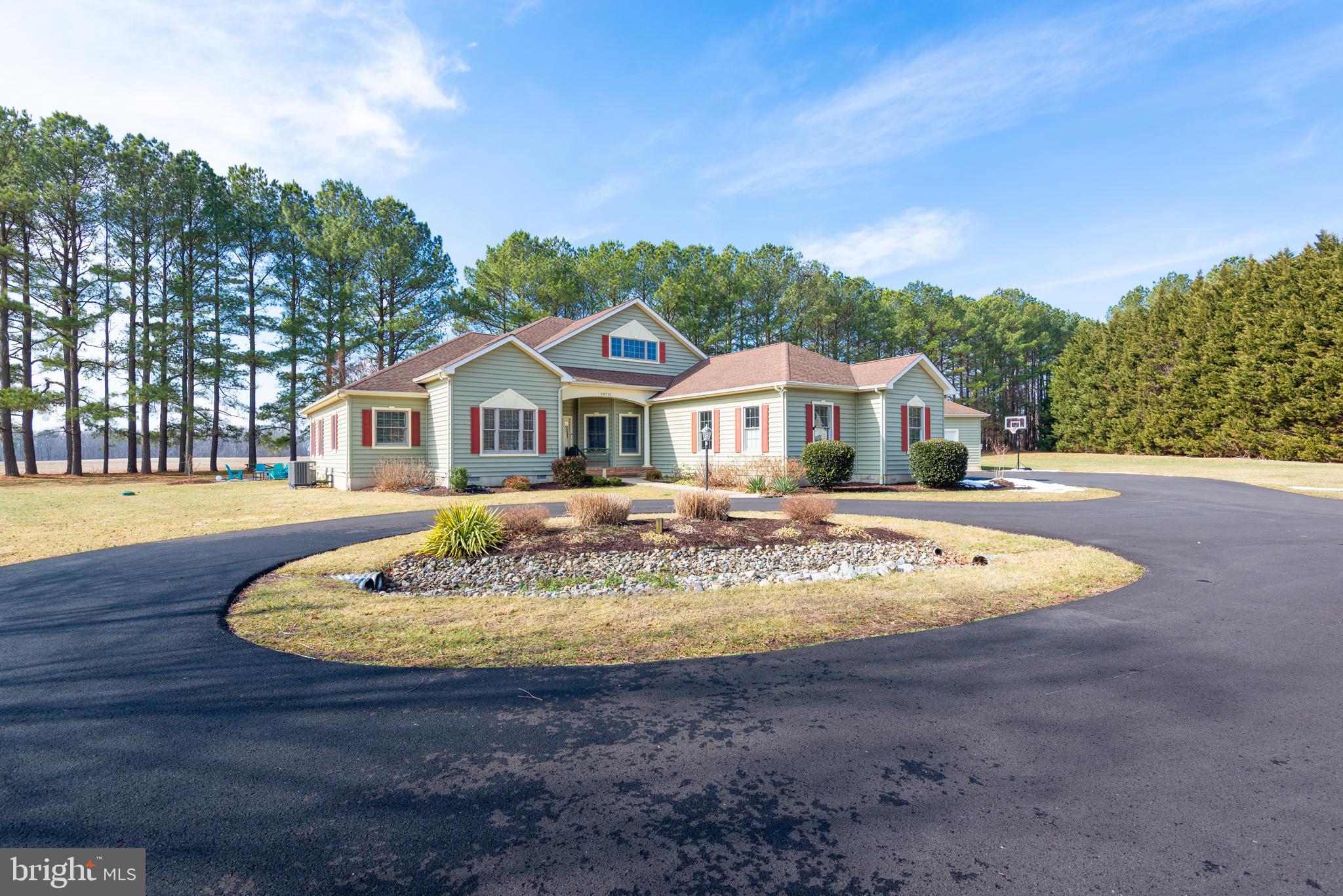 28715 Jacks Field Road Wye Mills, MD 21679 - Photo 1 of 27 a house with swimming pool in front of it