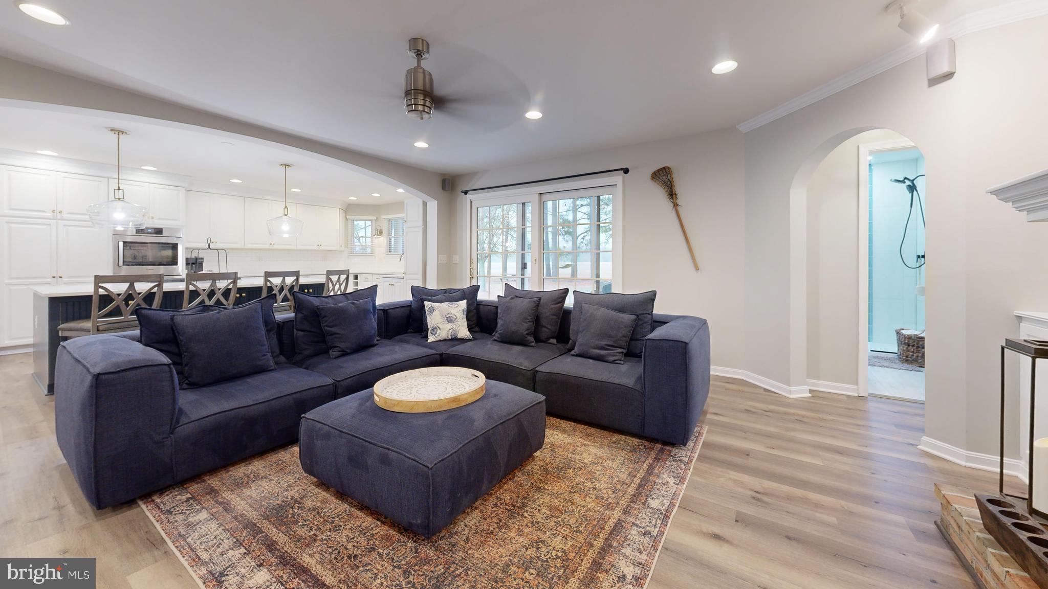 28715 Jacks Field Road Wye Mills, MD 21679 - Photo 12 of 27 a living room with furniture and a large window
