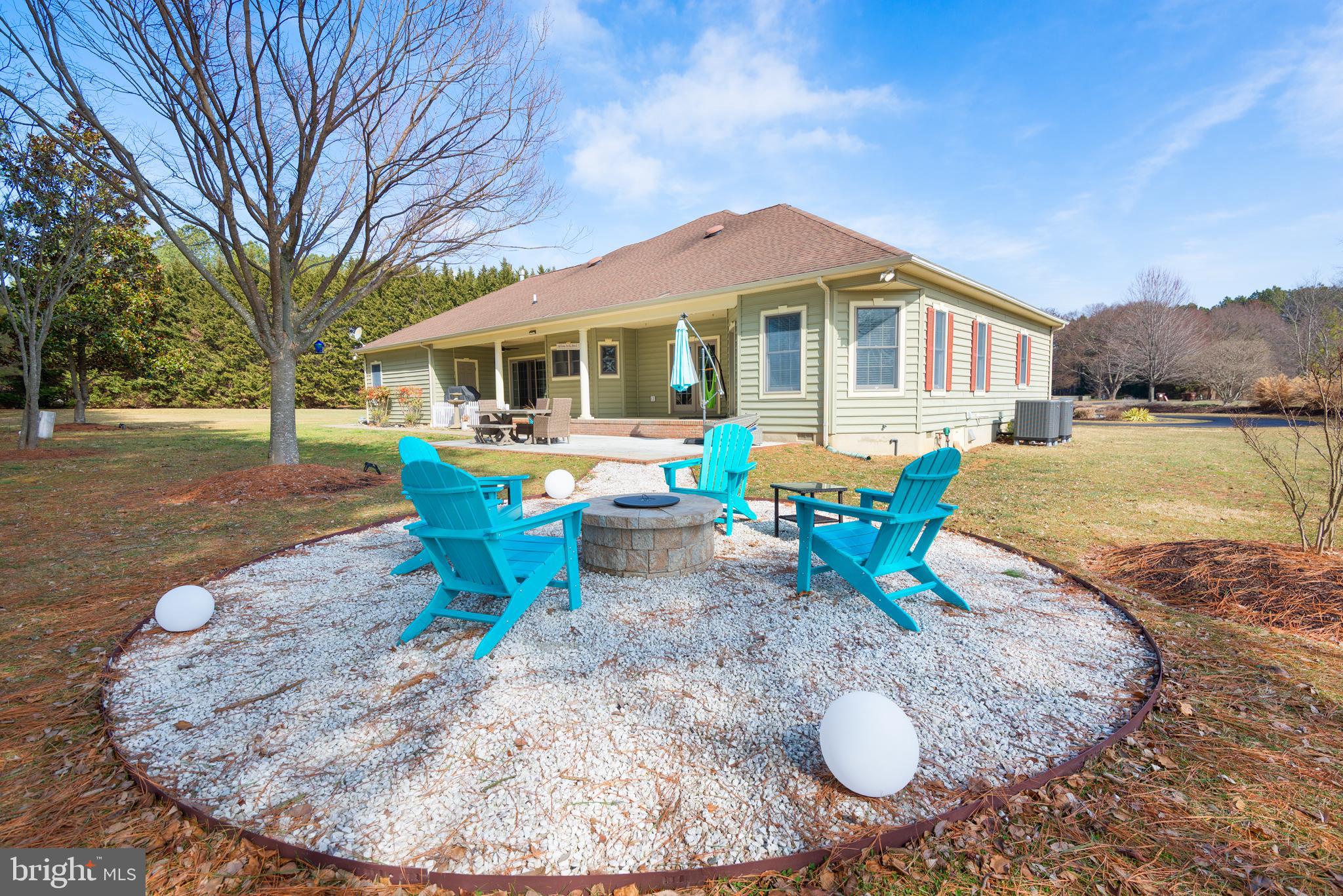 28715 Jacks Field Road Wye Mills, MD 21679 - Photo 27 of 27 a view of a house with backyard outdoor space and garden