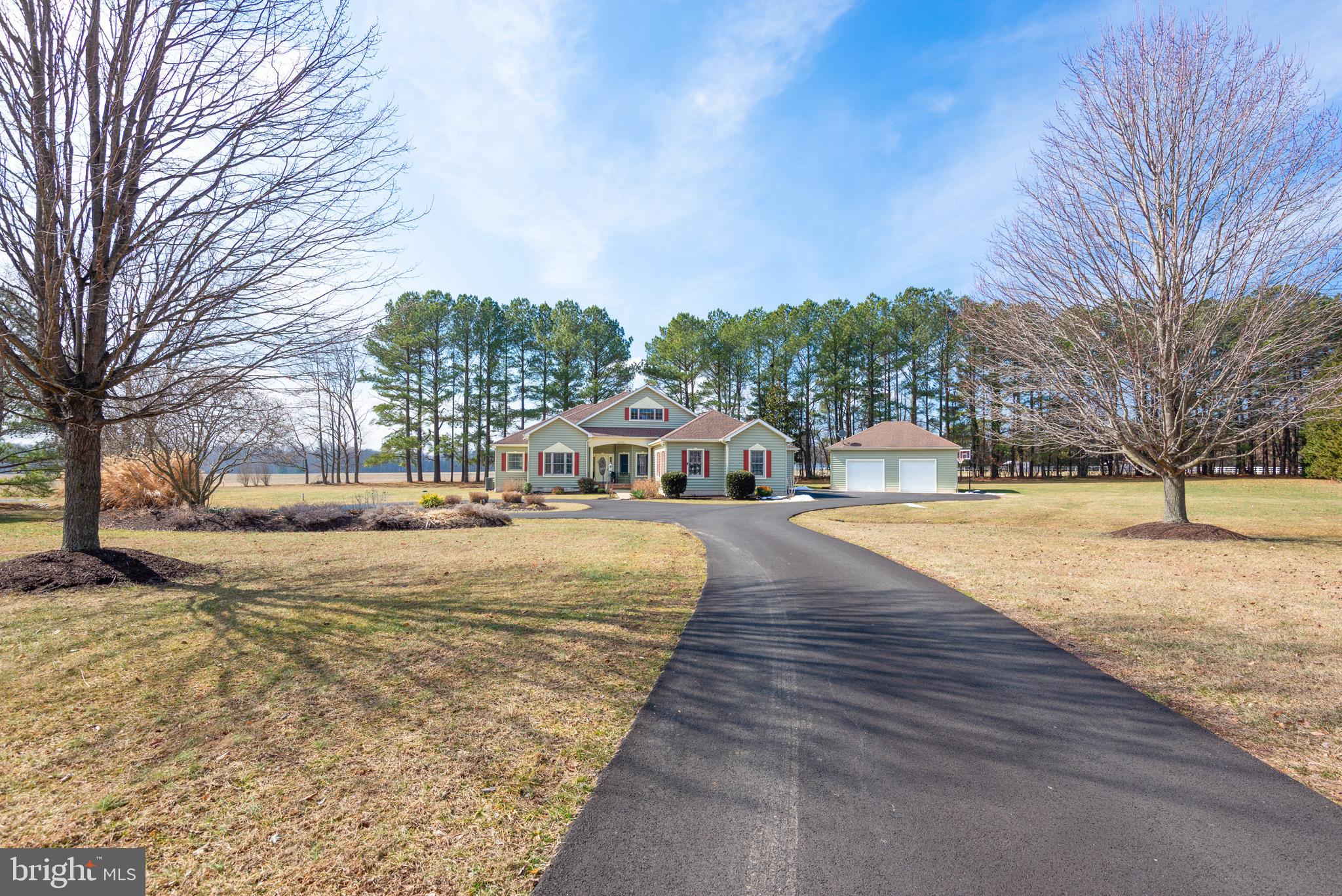 28715 Jacks Field Road Wye Mills, MD 21679 - Photo 4 of 27 a building with trees in front of it