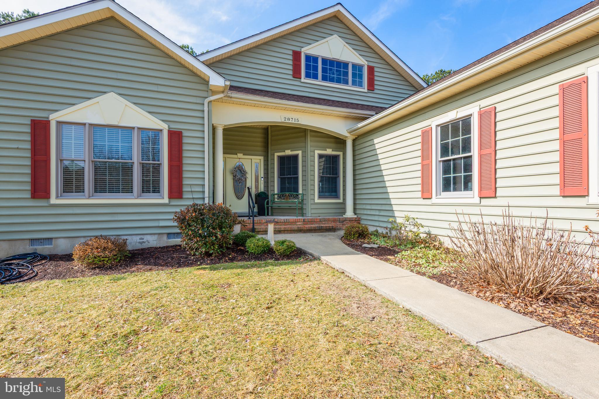 28715 Jacks Field Road Wye Mills, MD 21679 - Photo 8 of 27 a front view of a house with a yard