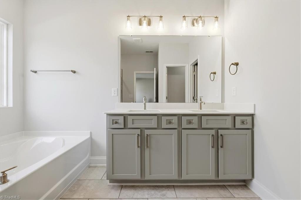 519 Valentine Court Graham, NC 27253 - Photo 23 of 42 primary bath