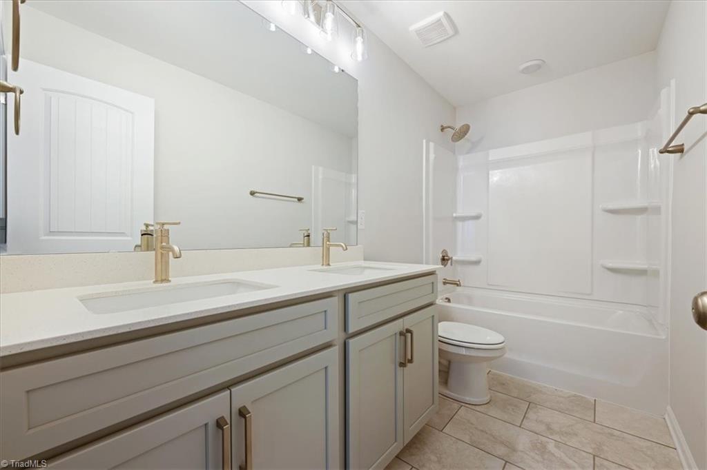 519 Valentine Court Graham, NC 27253 - Photo 27 of 42 upstairs hall bath