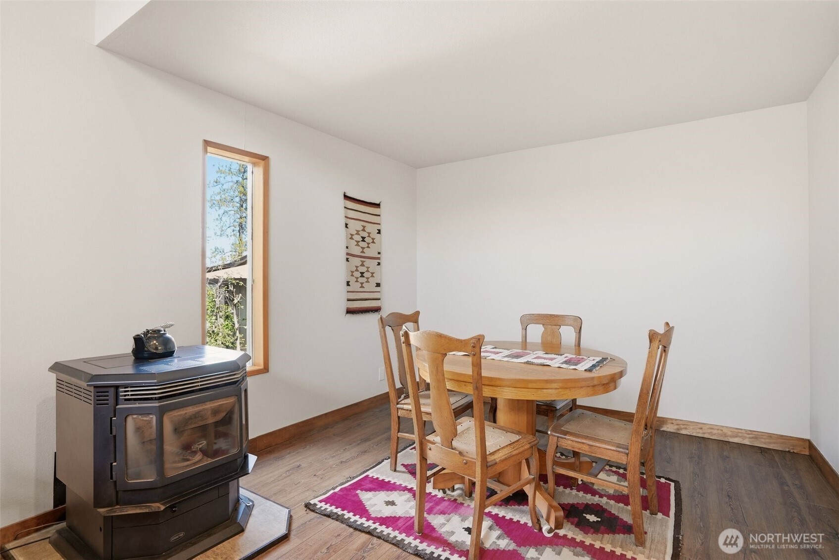 12119 South Spotted Road Cheney, WA 99004 - Photo 7 of 40 a view of a dining room with furniture and a window