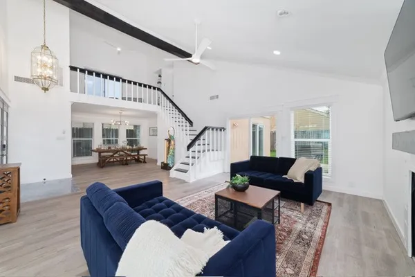a living room with furniture and a couch