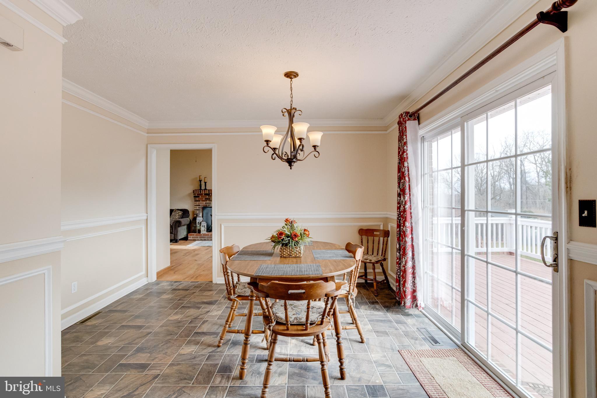 3217 Old Forge Hill Road Street, MD 21154 - Photo 19 of 46 Dining room off kitchen w chair & crown