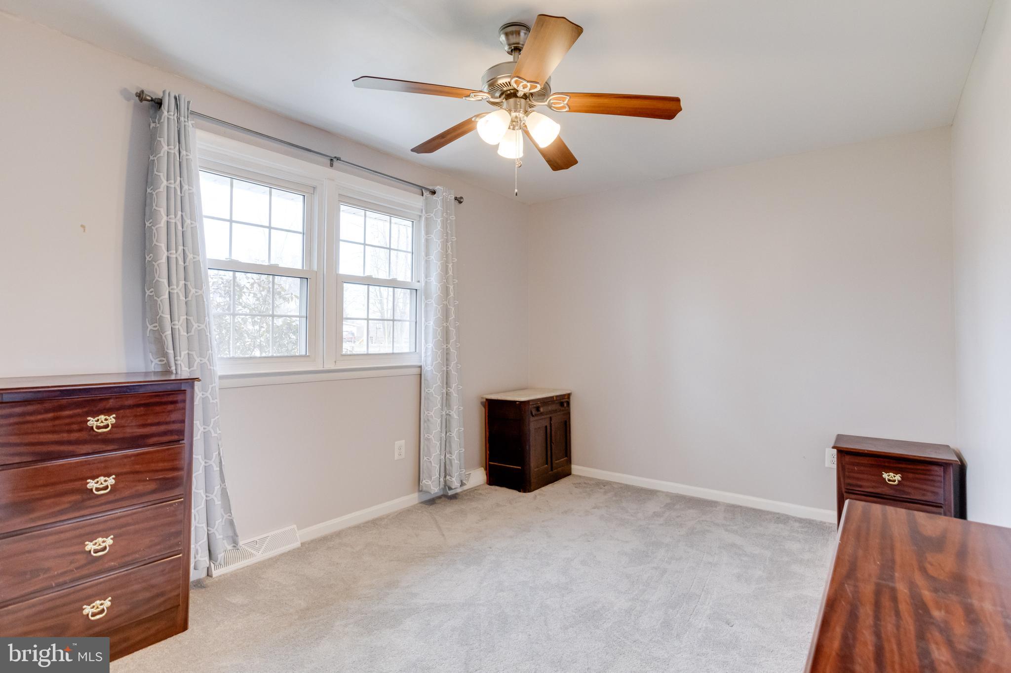 3217 Old Forge Hill Road Street, MD 21154 - Photo 36 of 46 Bedroom 3 with ceiling fan and double windows!