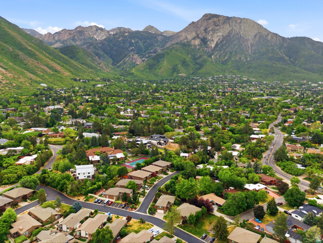 3674 Oak Rim Way Salt Lake City, UT 84109 - Photo 43 of 47 Expansive aerial showcasing a verdant residential area with mature trees and a network of streets