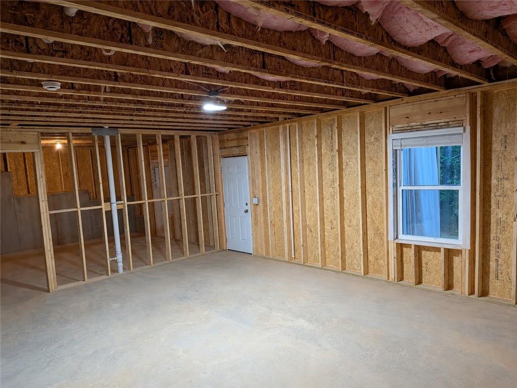 660 Groover Street Ball Ground, GA 30107 - Photo 34 of 53 a view of an empty room