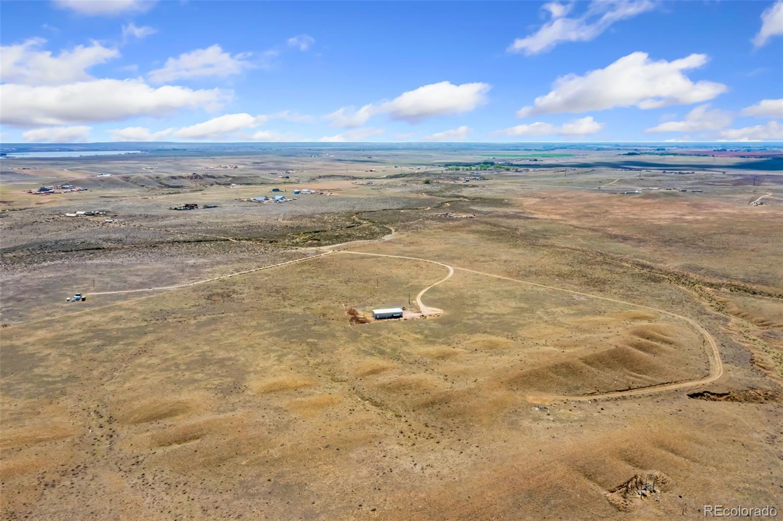 20179 Rawhide Flats Road Wellington, CO 80549 - Photo 6 of 12 a view of an ocean beach