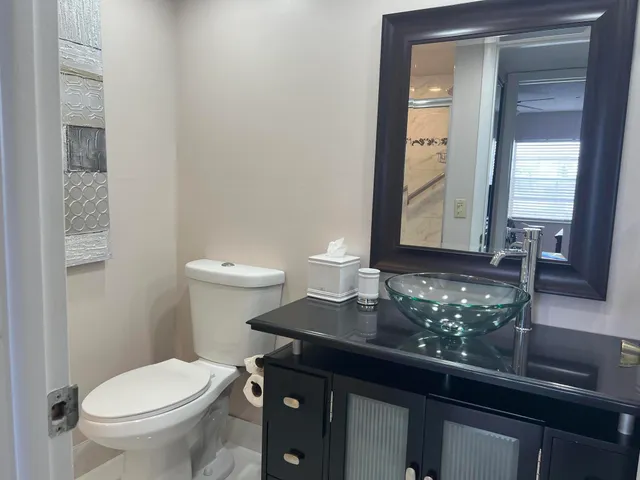 a bathroom with a sink and a toilet