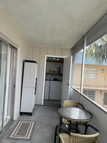 a room with furniture and window