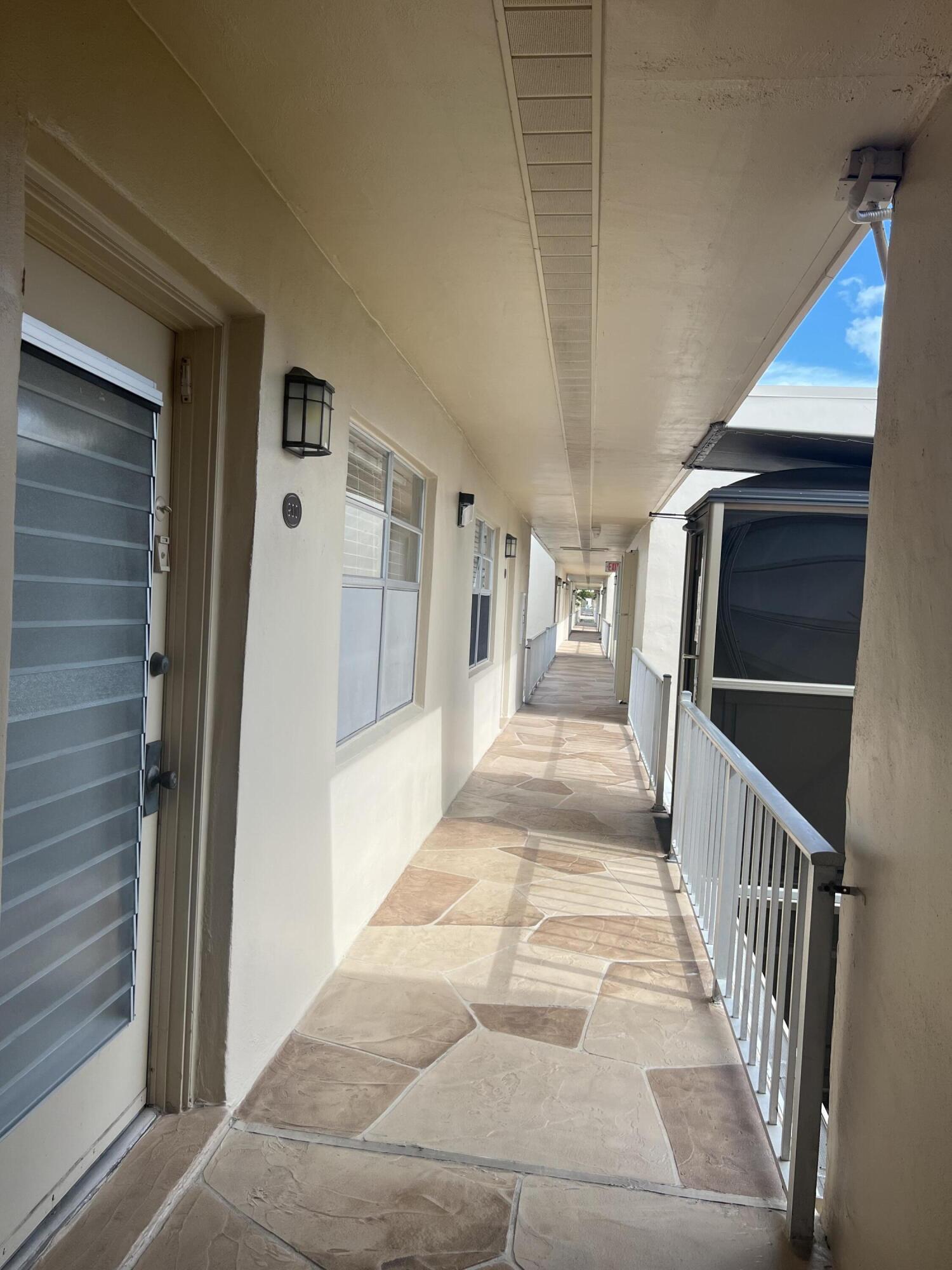 900 Flanders South Delray Beach, FL 33484 - Photo 2 of 52 a view of a hallway view with staircase