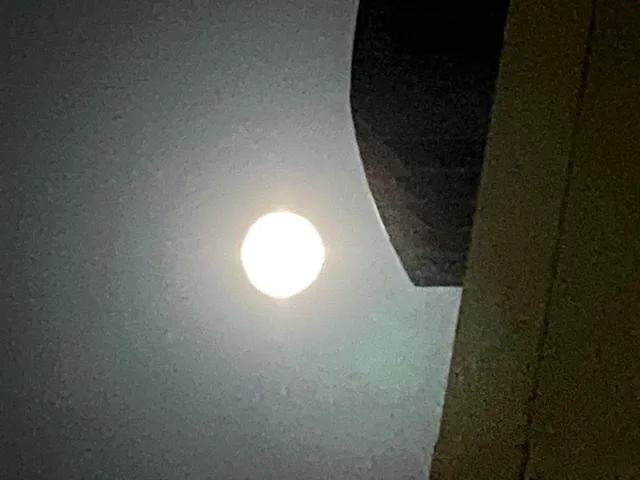 a view of an ocean and a building