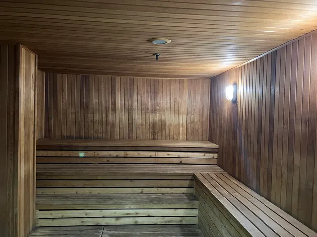a view of a hallway with dining area