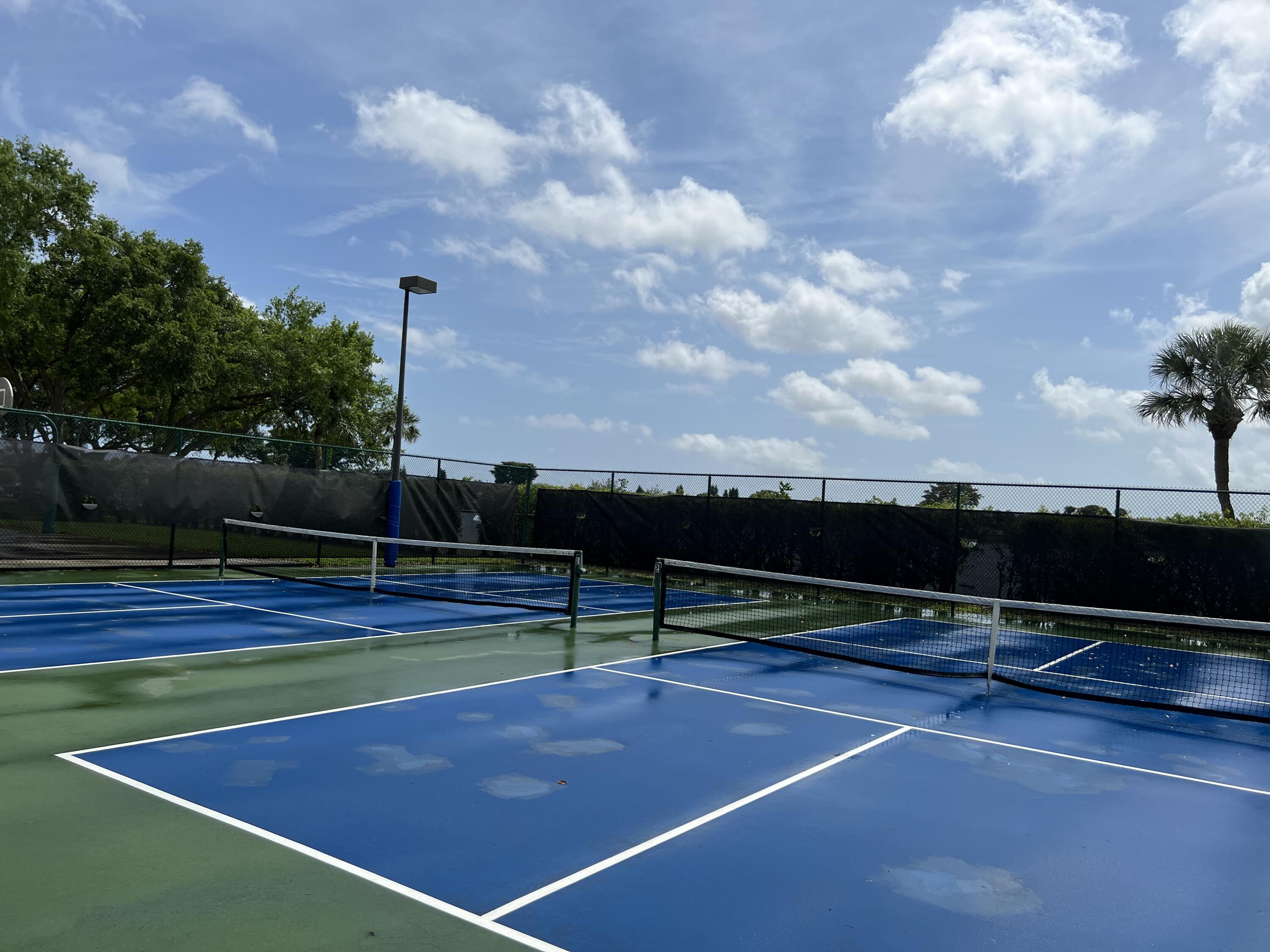 900 Flanders South Delray Beach, FL 33484 - Photo 52 of 52 a view of a tennis court