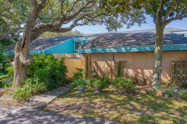 a view of a lake with a large trees