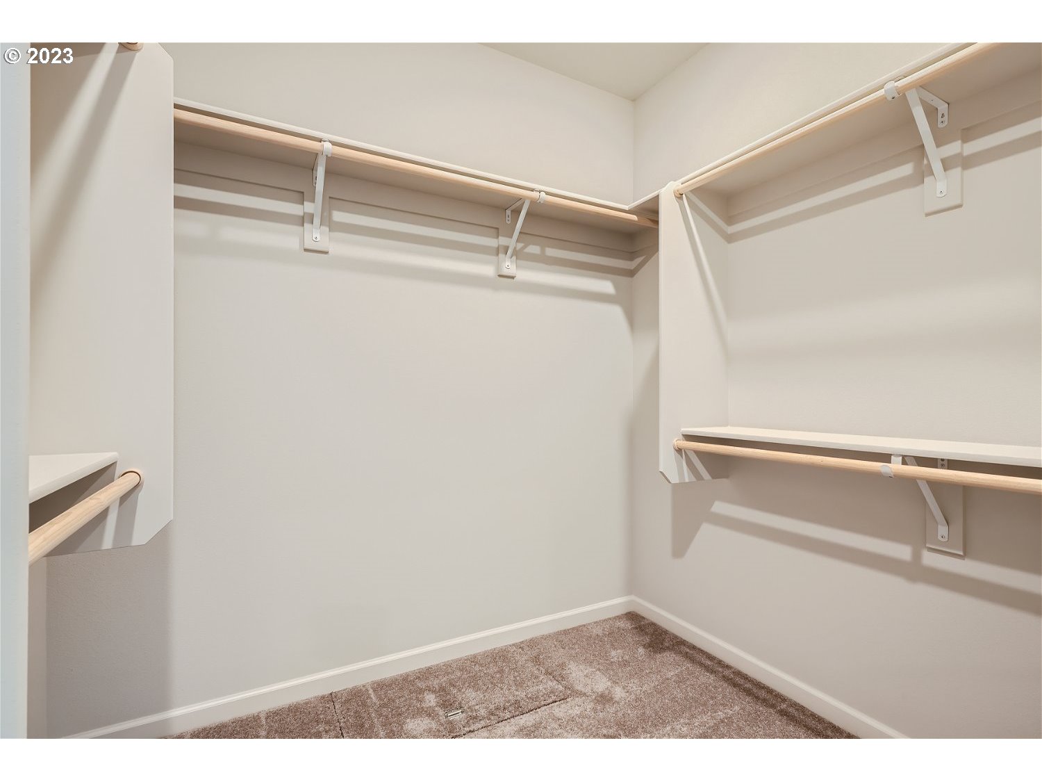 2706 South 7th Circle Ridgefield, WA 98642 - Photo 8 of 26 a view of walk in closet with empty racks