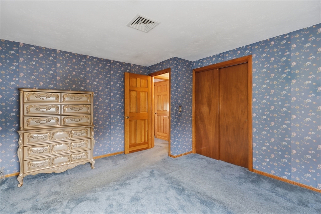 10 Deluca Road Milford, MA 01757 - Photo 23 of 37 an empty room with furniture and a closet