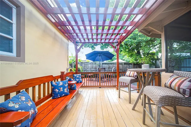 a room with water heater and a large window