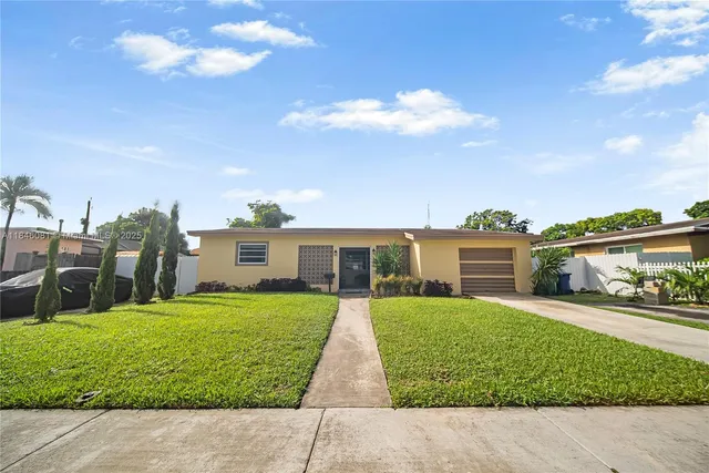 a house view with a garden space