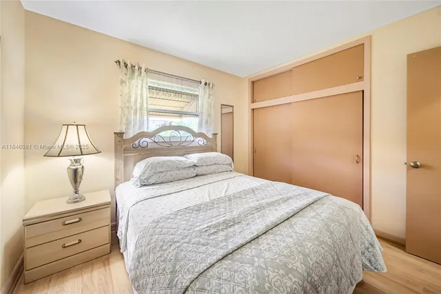 a bathroom with a sink a mirror and a shower