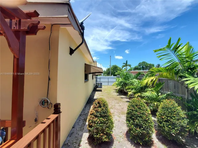 a house view with a outdoor space