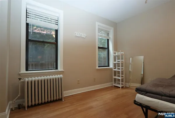 a view of a livingroom with furniture and windows