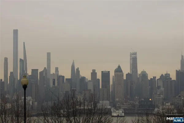 a view of a city with tall buildings