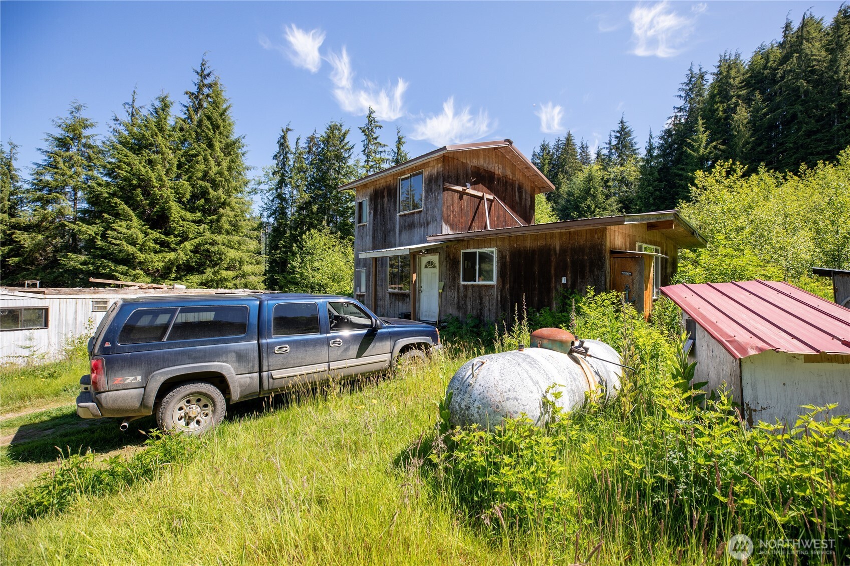 1884 Dowan Creek Road Forks, WA 98331 - Photo 1 of 35 a house view with a swimming pool