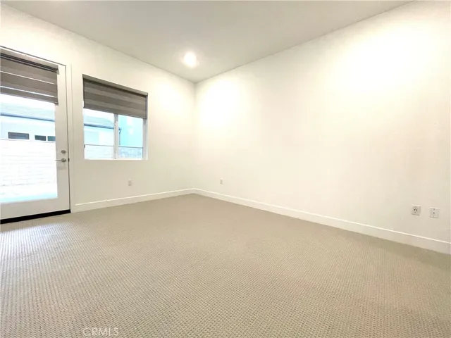 a bathroom with a shower sink and mirror