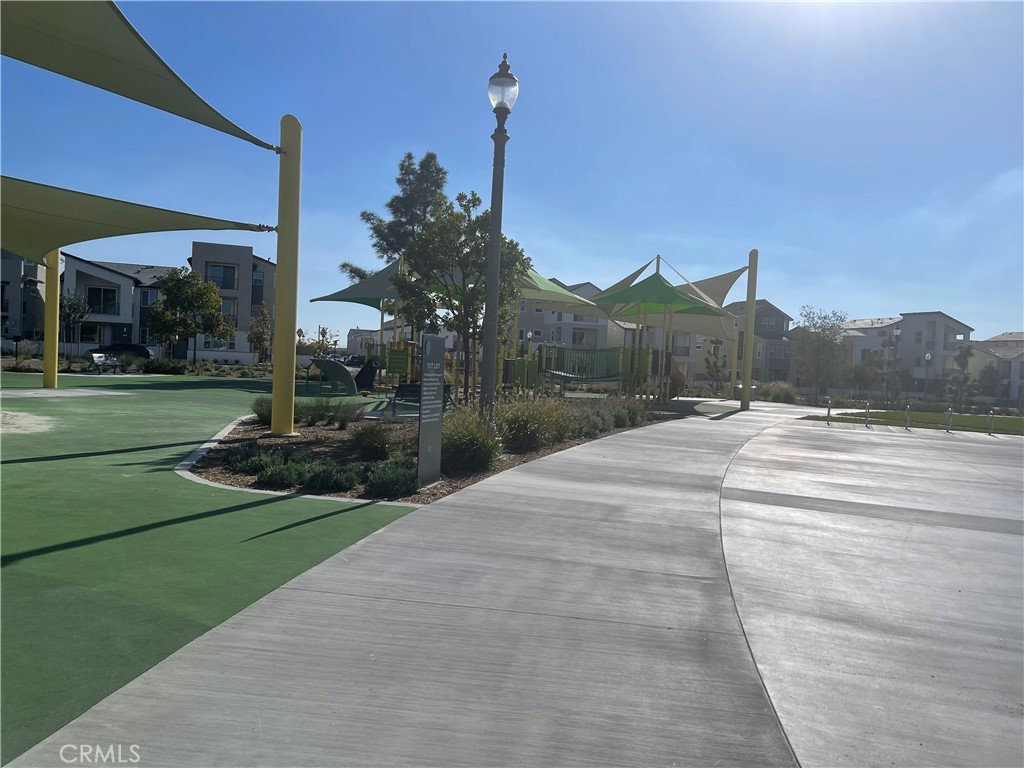 516 Neilson Irvine, CA 92618 - Photo 3 of 21 a view of a street with a building in the background