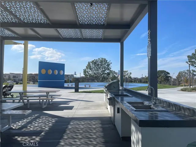 a view of an outdoor dining space with furniture
