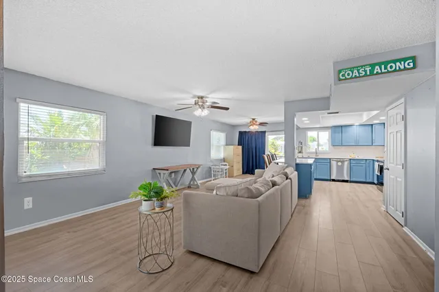 a living room with furniture and a window