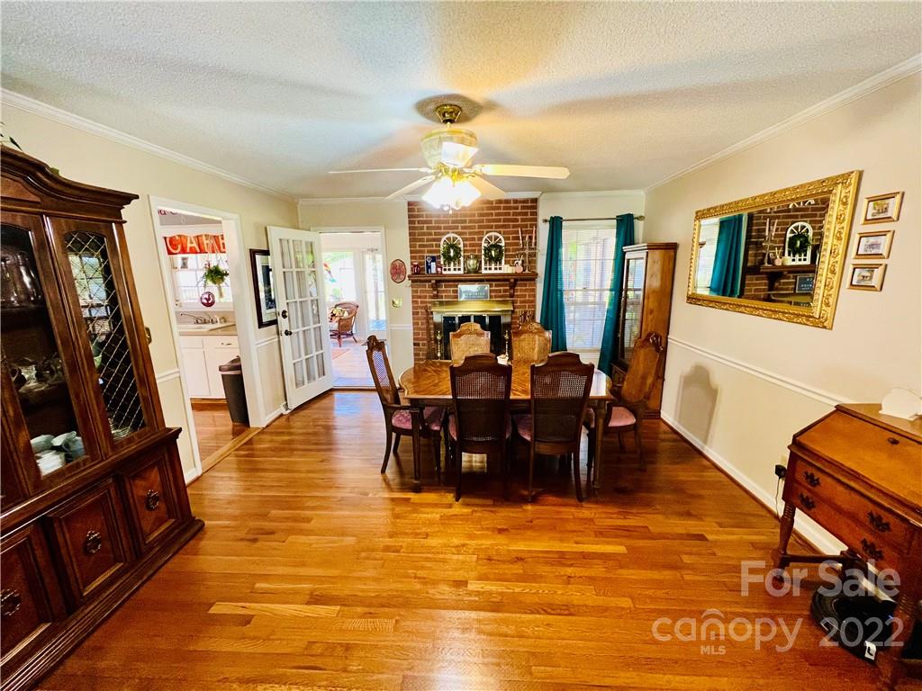 13701 Thompson Road Mint Hill, NC 28105 - Photo 14 of 25 a view of a dining room with furniture
