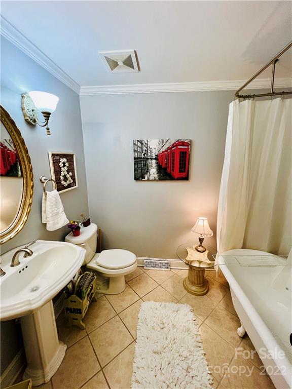 13701 Thompson Road Mint Hill, NC 28105 - Photo 16 of 25 a bathroom with a sink toilet and a mirror