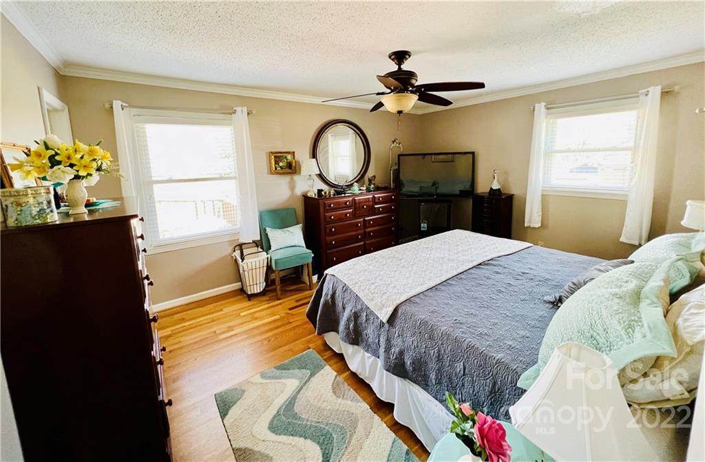 13701 Thompson Road Mint Hill, NC 28105 - Photo 19 of 25 a bedroom with a bed dresser and a window