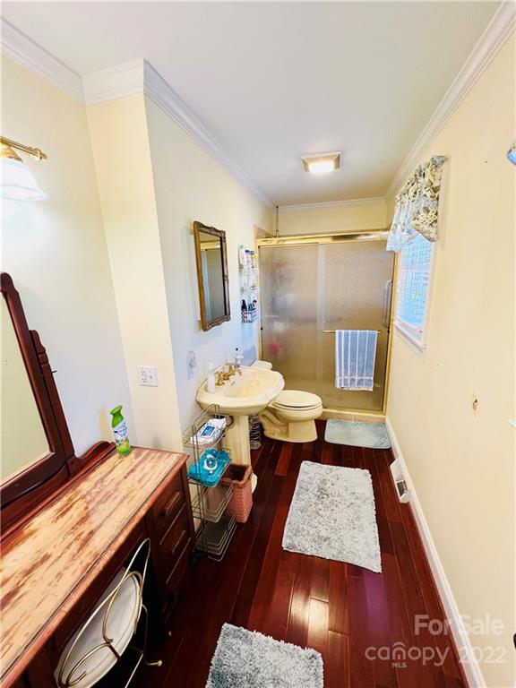 13701 Thompson Road Mint Hill, NC 28105 - Photo 20 of 25 a living room with a rug and a table