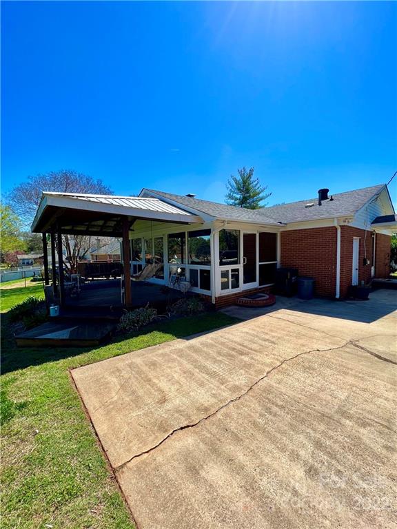 13701 Thompson Road Mint Hill, NC 28105 - Photo 2 of 25 a view of house with outdoor space and swimming pool