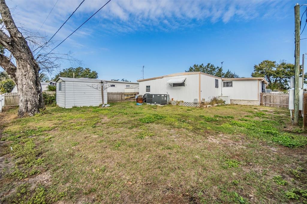 5646 Ave New Port New Port Richey, FL 34652 - Photo 19 of 29 a view of a house with a yard