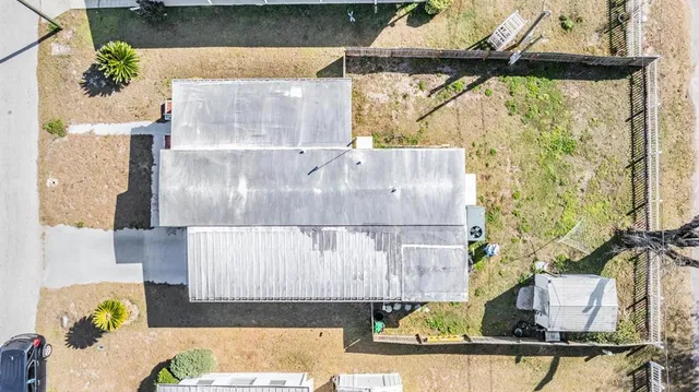 a picture of a bathroom with a sink and a mirror
