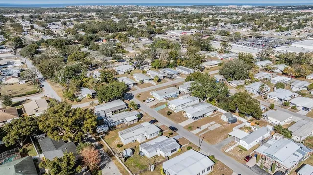 an aerial view of a city with lots of residential buildings