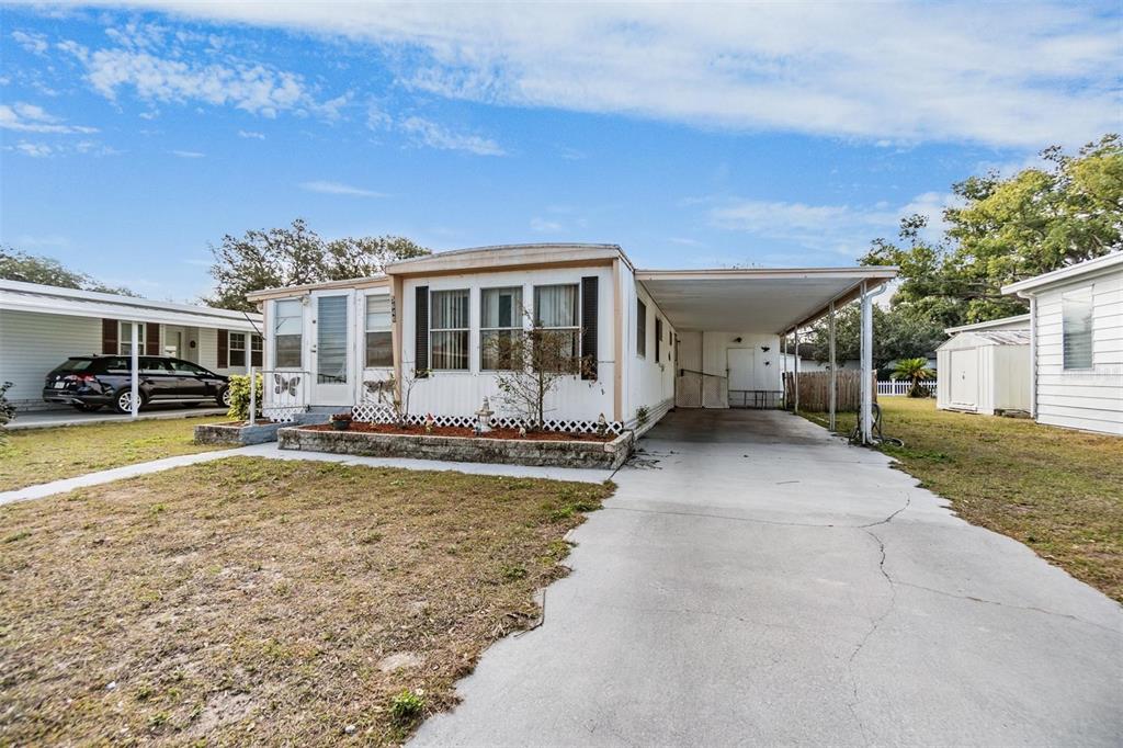 5646 Ave New Port New Port Richey, FL 34652 - Photo 28 of 29 a view of a house with swimming pool and sitting area