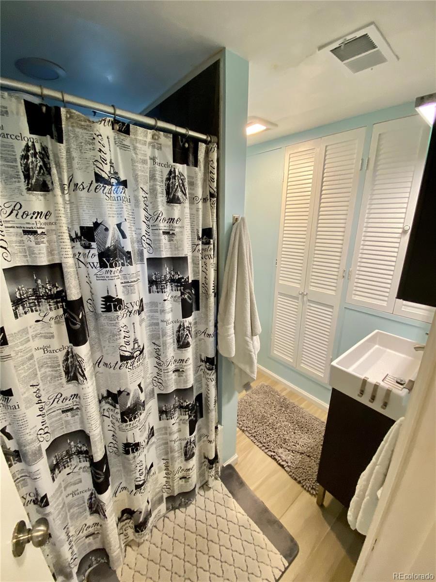 44 Pine Road Golden, CO 80401 - Photo 22 of 35 a view of walk in closet with clothes and shoes