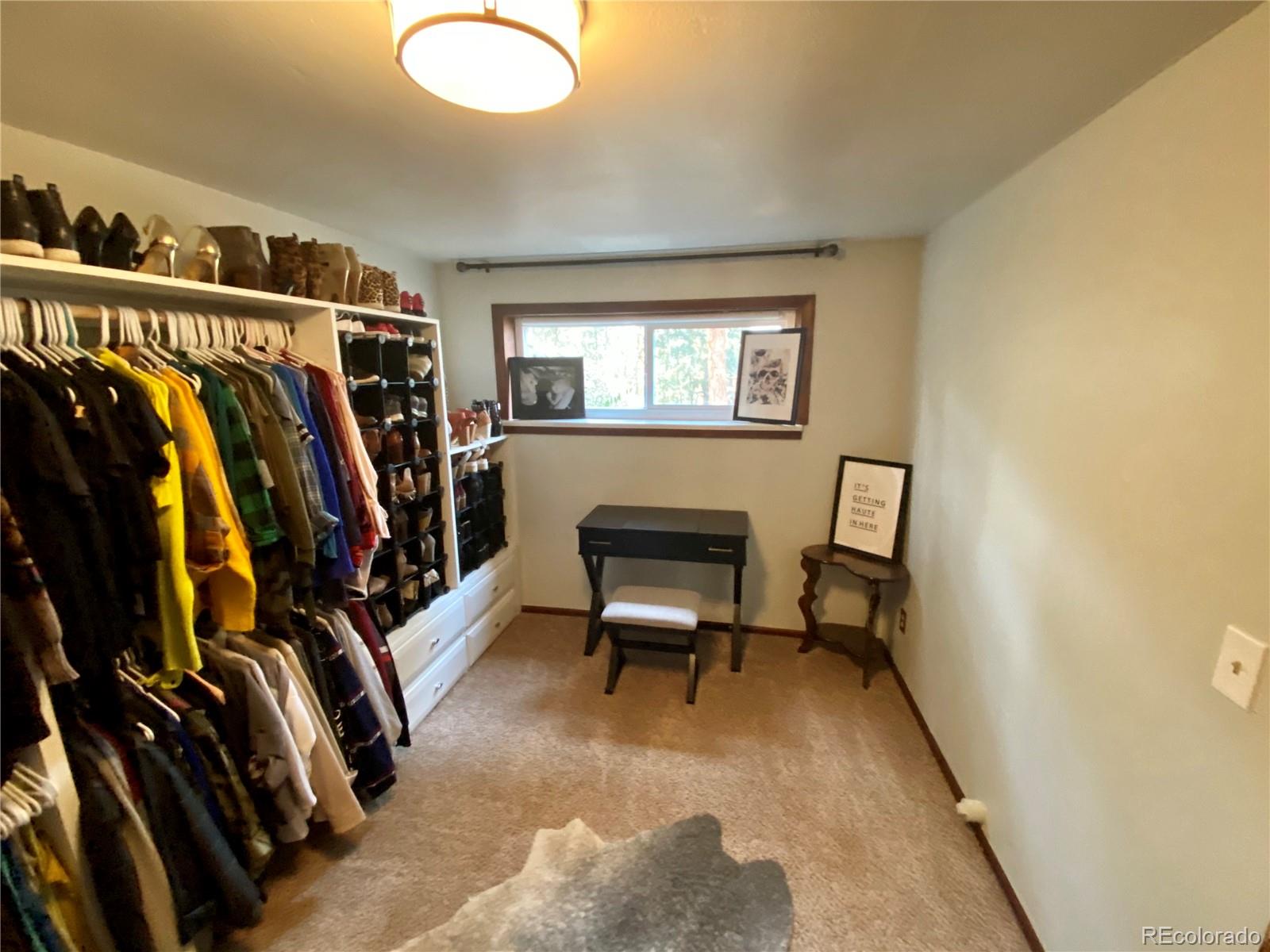 44 Pine Road Golden, CO 80401 - Photo 26 of 35 a view of a room with gym equipment