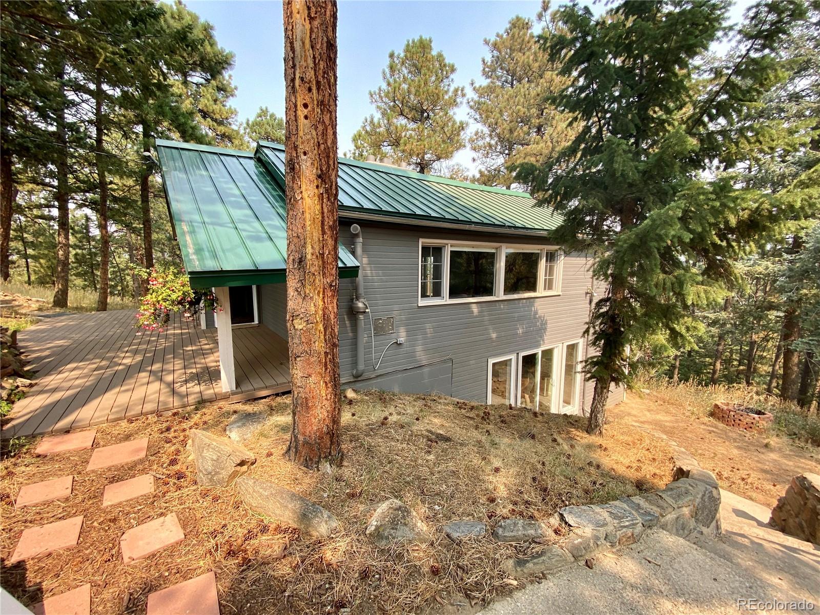 44 Pine Road Golden, CO 80401 - Photo 3 of 35 a house view with a outdoor space